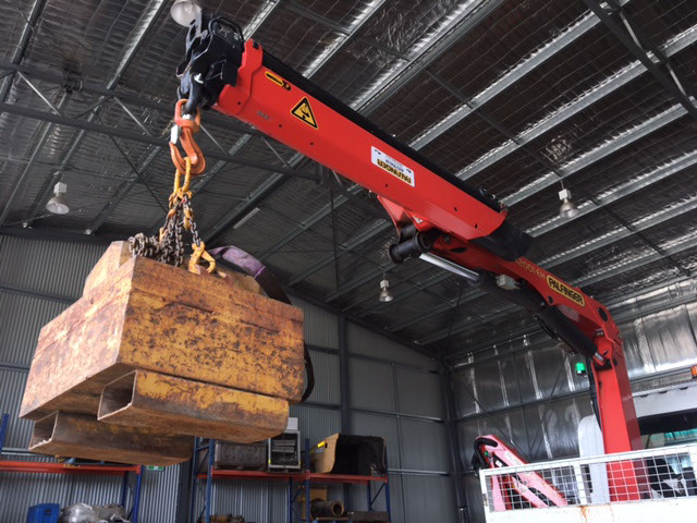 Load testing Palfinger vehicle loading crane.